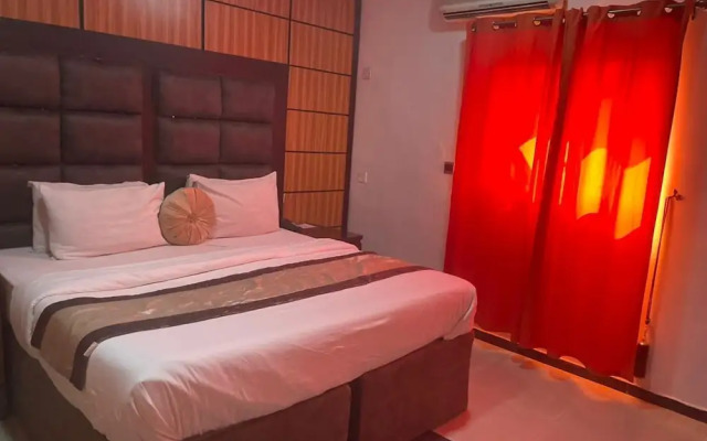 Brick Rock Hotel And Suites