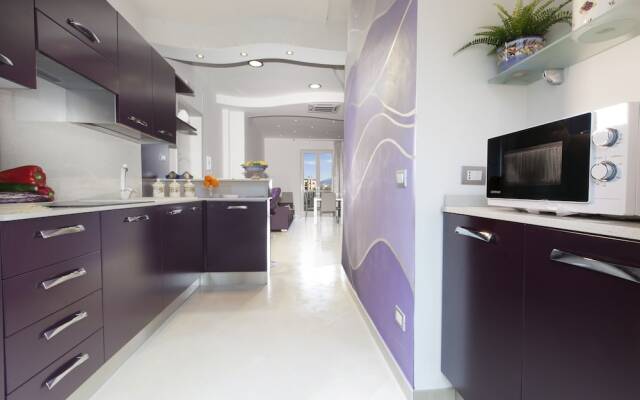 Estate4home- L'Onda Viola