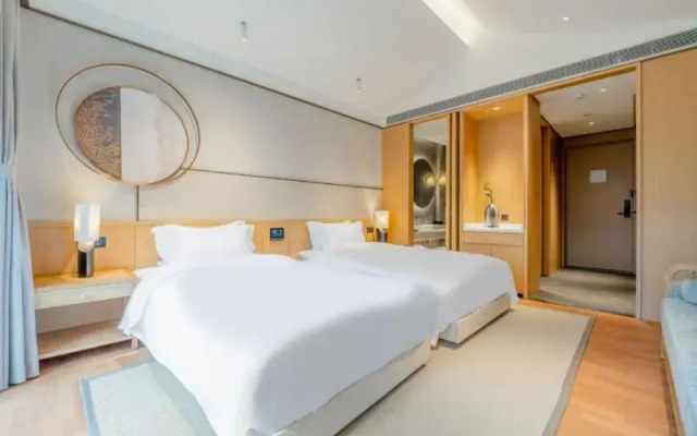 Blossom Hill Hotel Qingdao Aduohuayu