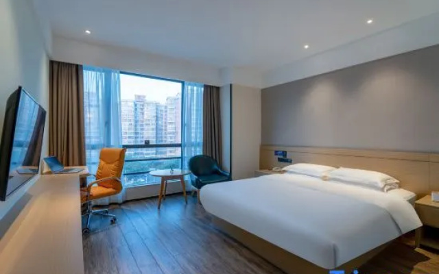Guangzhou XinQiDian Hotel (Baiyun Dongping Railway Station)
