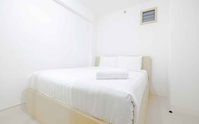 Minimalist & Clean 2BR Bassura City Apartment By Travelio