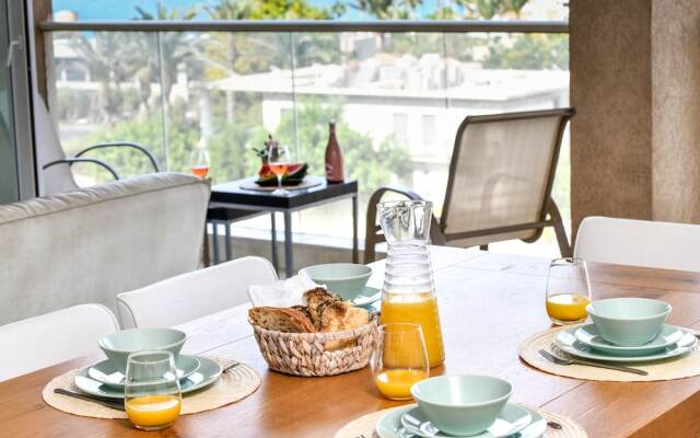Modern Gem with Stunning Balcony by Sea N Rent
