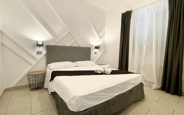 Le Village Sarzana