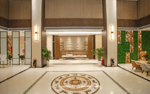 Qianmei International Hotel (Shaoguan Nanxiong Covered Bridge)