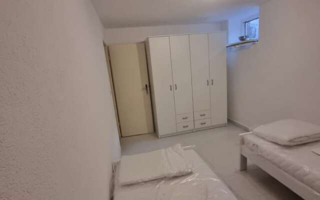 Four Bedroom apt w Patio Close to Beach and Center