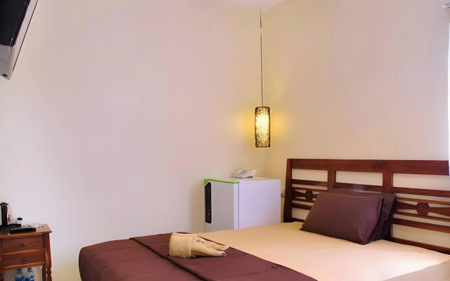 Kuta Sari House – Guest Rooms – Kuta