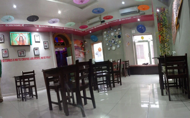 Del Tingo Al Tango Hostal