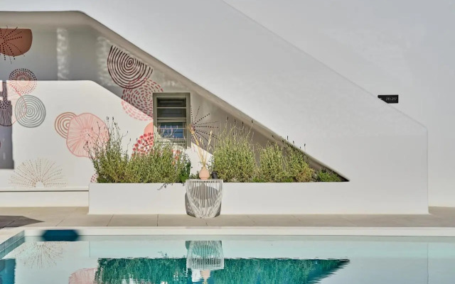 Adorno Beach Hotel & Suites