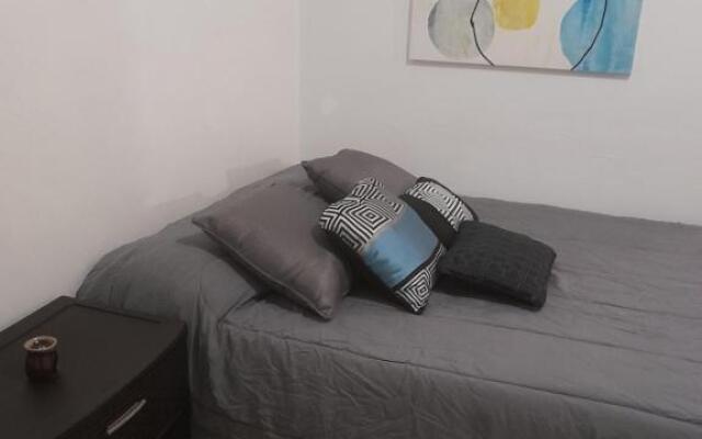 Cozy apartment across the San Juan airport
