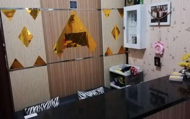 The Suites Metro Ananda Home