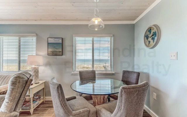 Newly Remodeled Oceanfront Condo with Salt Water Pool and Private Walkway to Beach by RedAwning