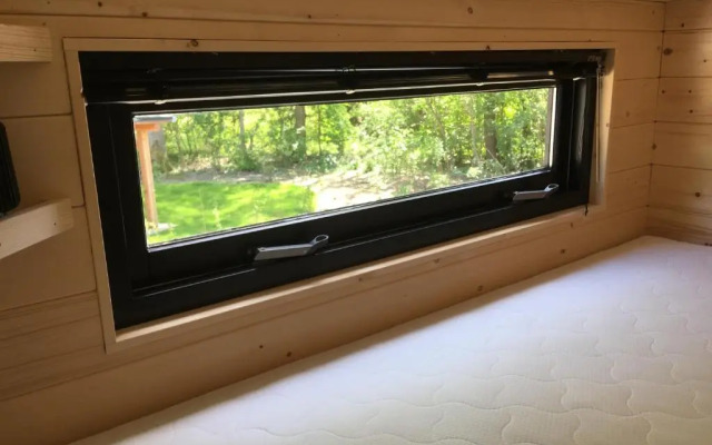 Fraai Tiny House aan het veluwemeer met uitzicht & veranda