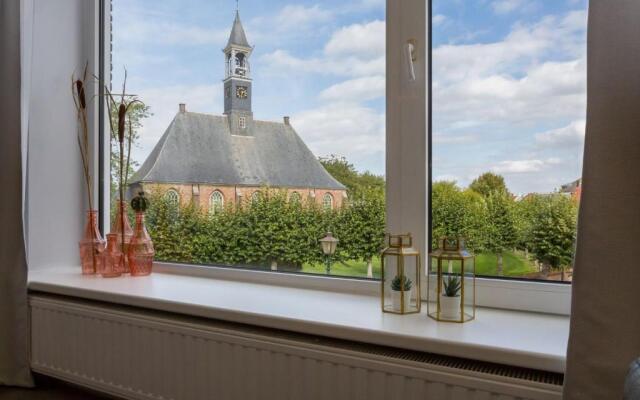 Groepsappartement- Dorpsplein 6 Koudekerke Pleinzicht