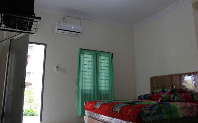 Penginapan Transit Tomato