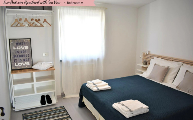 BeachFront Attic Apartment - access to private beach club