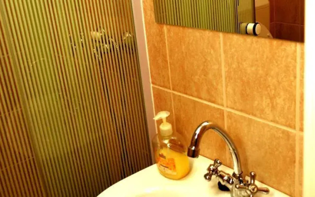 Almaliget Apartmanház