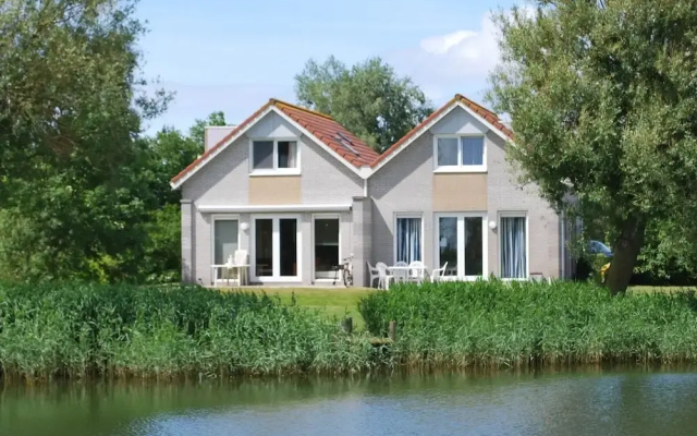 Nice Holiday Home on the Water in Friesland
