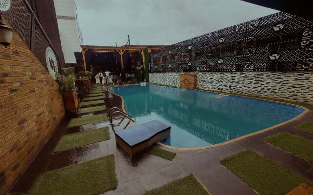 Olympus Hotel & Suites