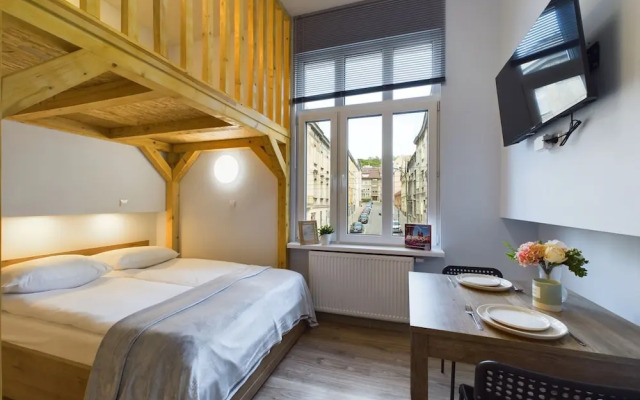 Wooden Cracow Apartment by Renters