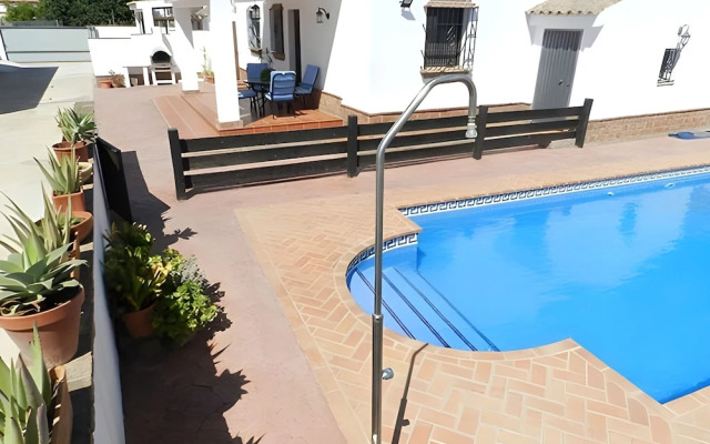 Apartamentos piscina compartida