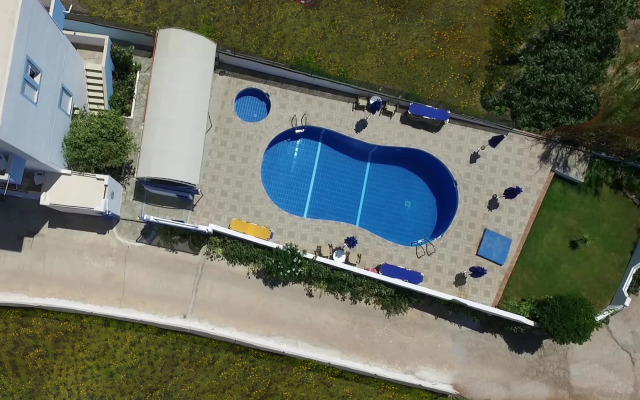 Helios Studios & Apts