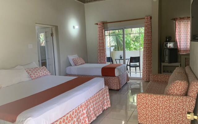 King Suite at Oceanview Resort in Jamaica - Enjoy 7 Miles Of White Sand Beach! 1 Bedroom Villa by Redawning