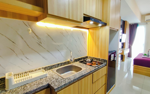 Wood Accents Studio At Grand Dharmahusada Lagoon Apartment