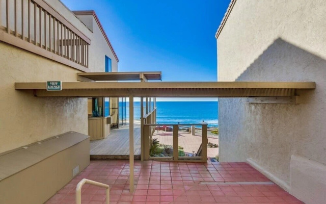 Luxury Ocean View Condo features Direct Access to Beach SBTC331 by RedAwning