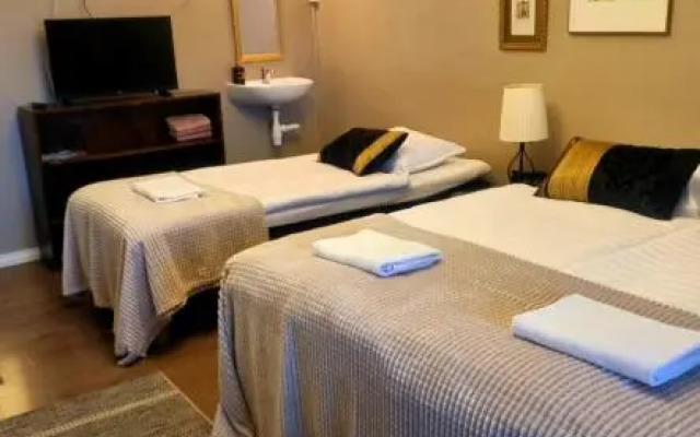 Wanha Neuvola Guesthouse & Apartment