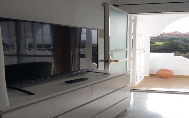 Sunny and spacious apartment with own entrance to pool