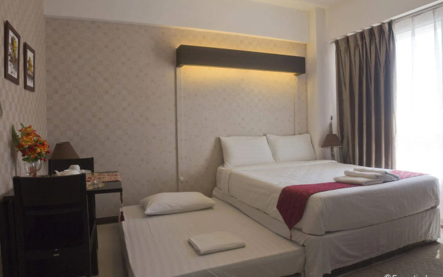Zen Rooms Sunshine City Suites