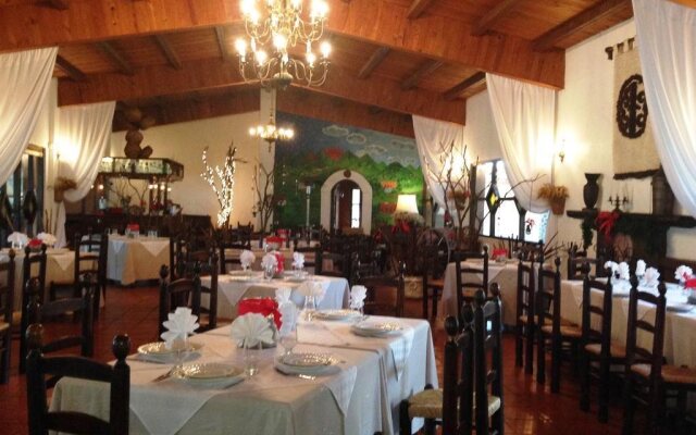 Hotel Rancho El 7