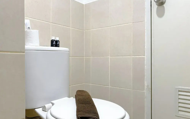 Tidy and Warm 2BR at Podomoro Golf View Apartment