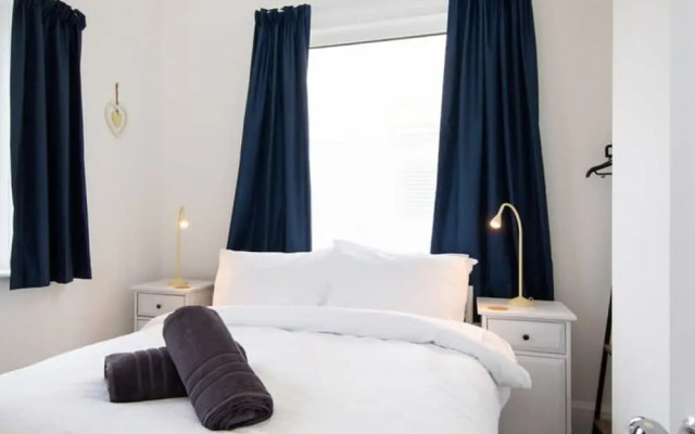 Absolute Beachfront With Decked Garden Oasis and Views