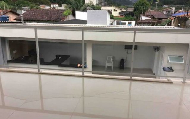 Casa com piscina em Caraguatatuba