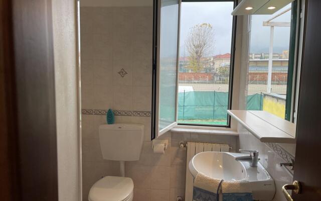 Snug holiday home in Loano with shared pool