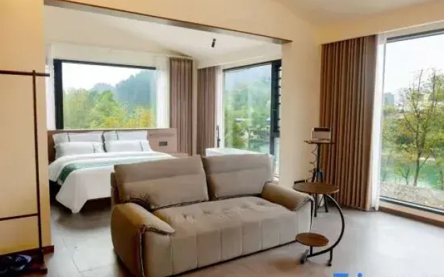 Xinxin River View Homestay (Border City Chatong Scenic Area)