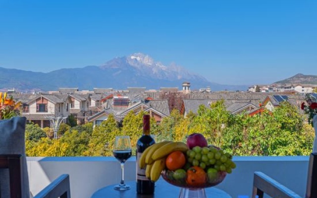 Qianshan Muxue · Sun Goldens · Yulong Snow Mountain View · Golden Snowscape Designer Lodge – Outside – Lijiang