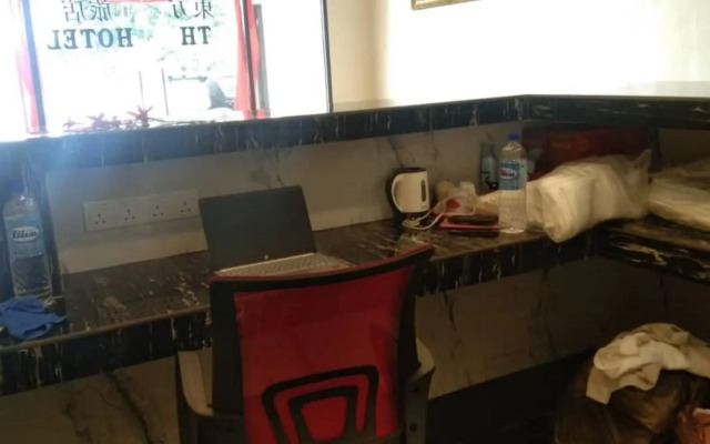 Th Hotel by OYO Rooms