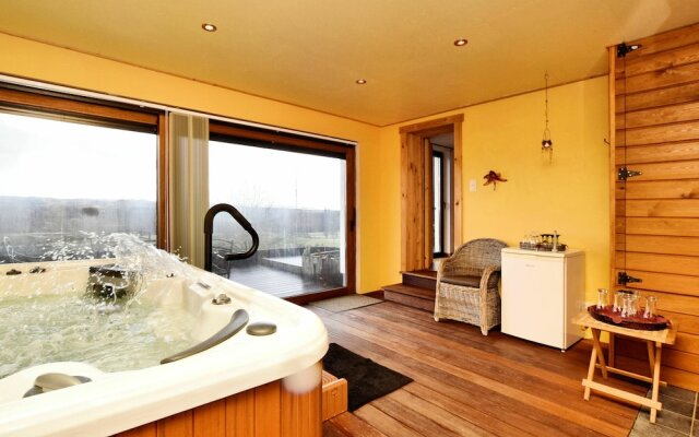 Cozy Holiday Home in Dion with Sauna and Jacuzzi