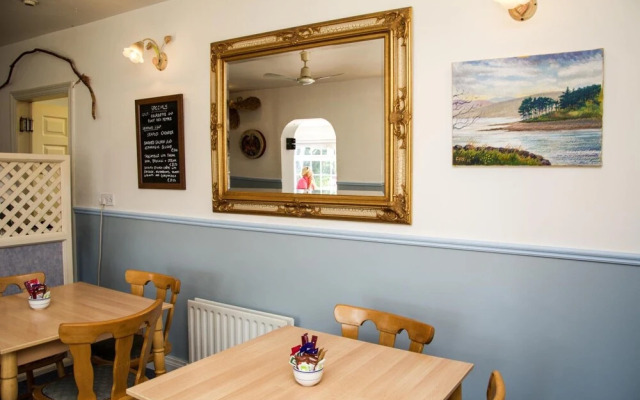 The Rose Garden Bed & Breakfast and Cafe