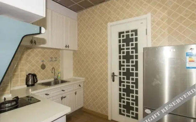 Dalian Xinghai Square Holiday Apartment