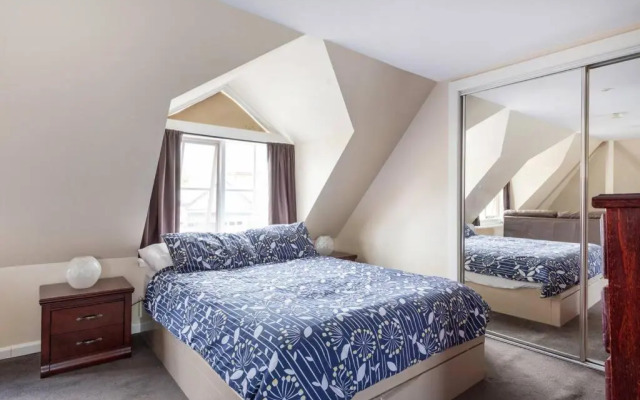 Upstairs Studio Apartment with street access