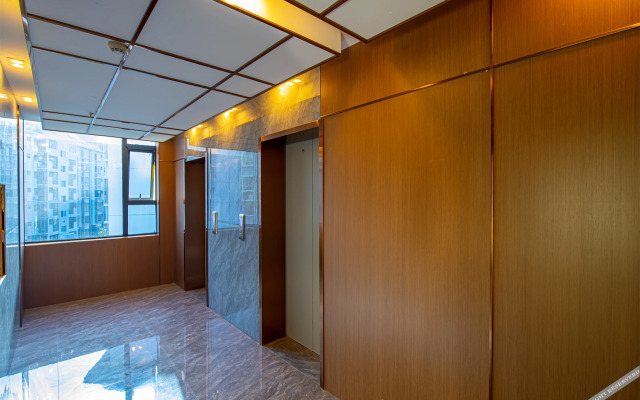 Poltton International Server Apartment(铂顿国际公寓（象州梦幻夜金象路店）)