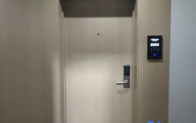 Junyi Chain Hotel (Xishui Zhongbai Storage Chinese Medicine Hospital Branch)