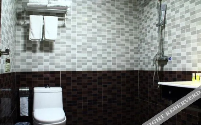 Wanlong Business Hotel