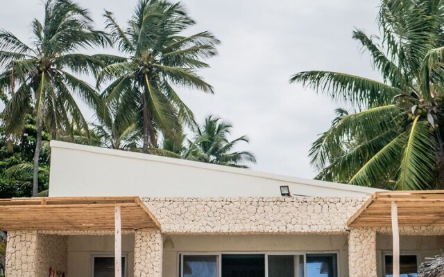 Neema Barefoot Beach House