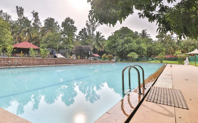 Holiday Palms by OYO Rooms