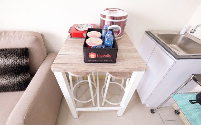 2 Bedrooms at Green Pramuka City Apartment By Travelio