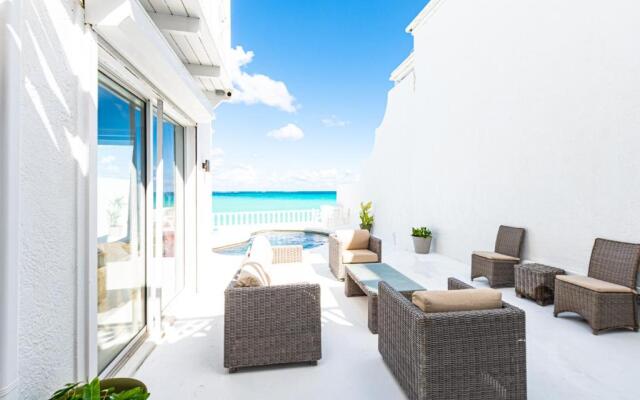 Caprice 5 -Private Beachfront Home in Gated Community